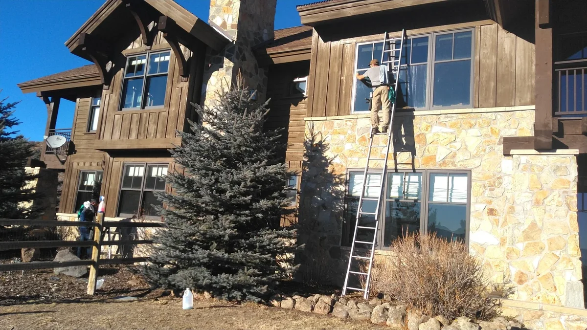 Clean residential windows in a Utah mountain home
